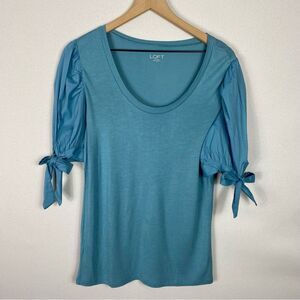 Loft Blue Peplum Top with Detailed Bow Ties around arm